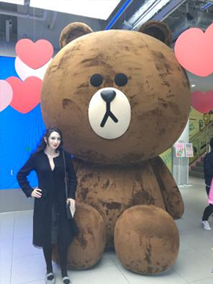 Me standing next to a bear